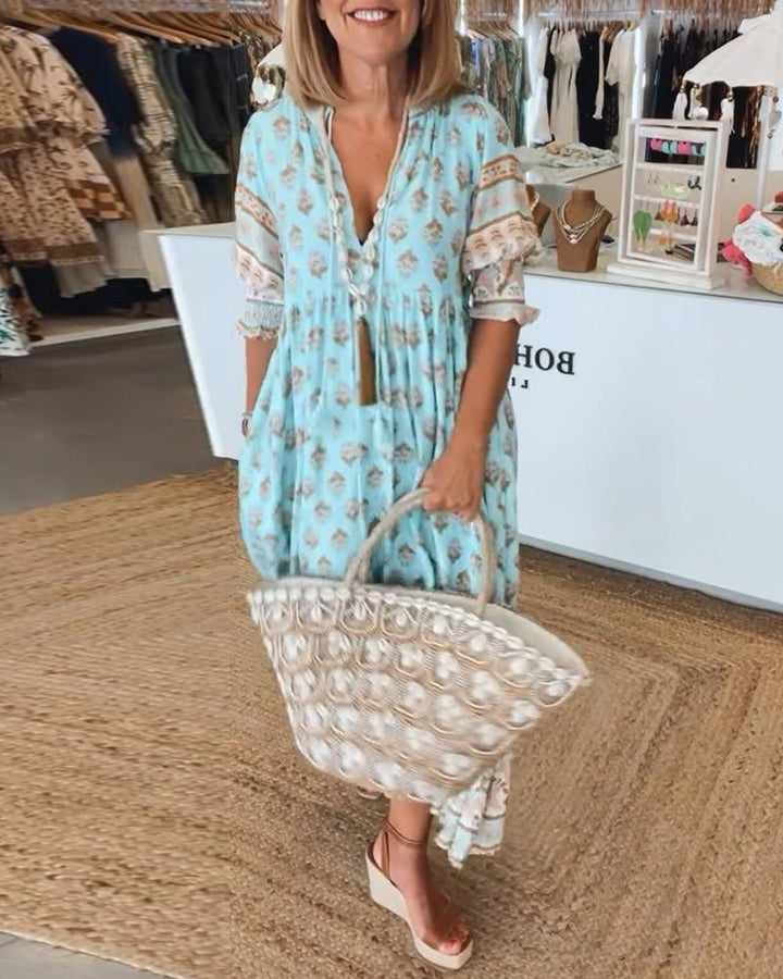 Mana | Abito floreale chic con scollo a V