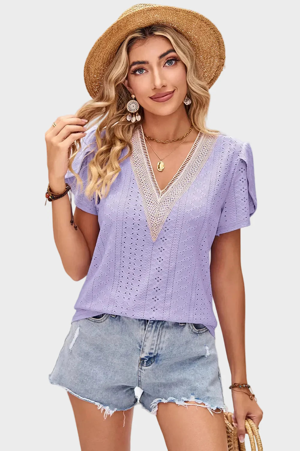 Top in pizzo scollo a V
