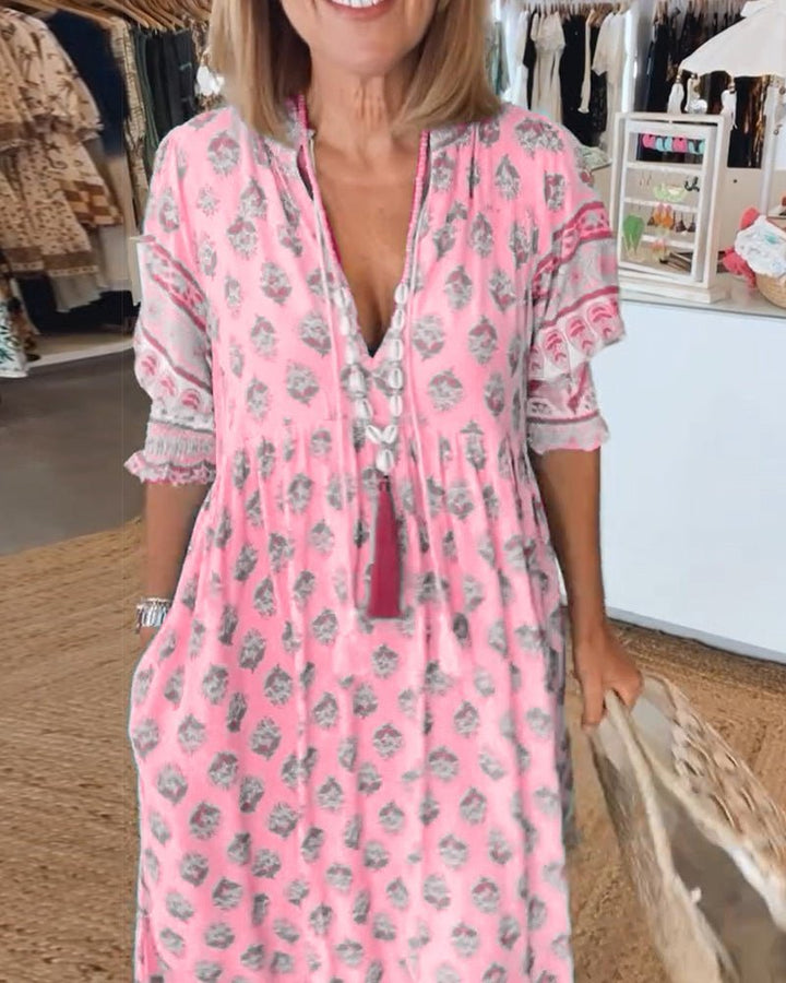 Mana | Abito floreale chic con scollo a V