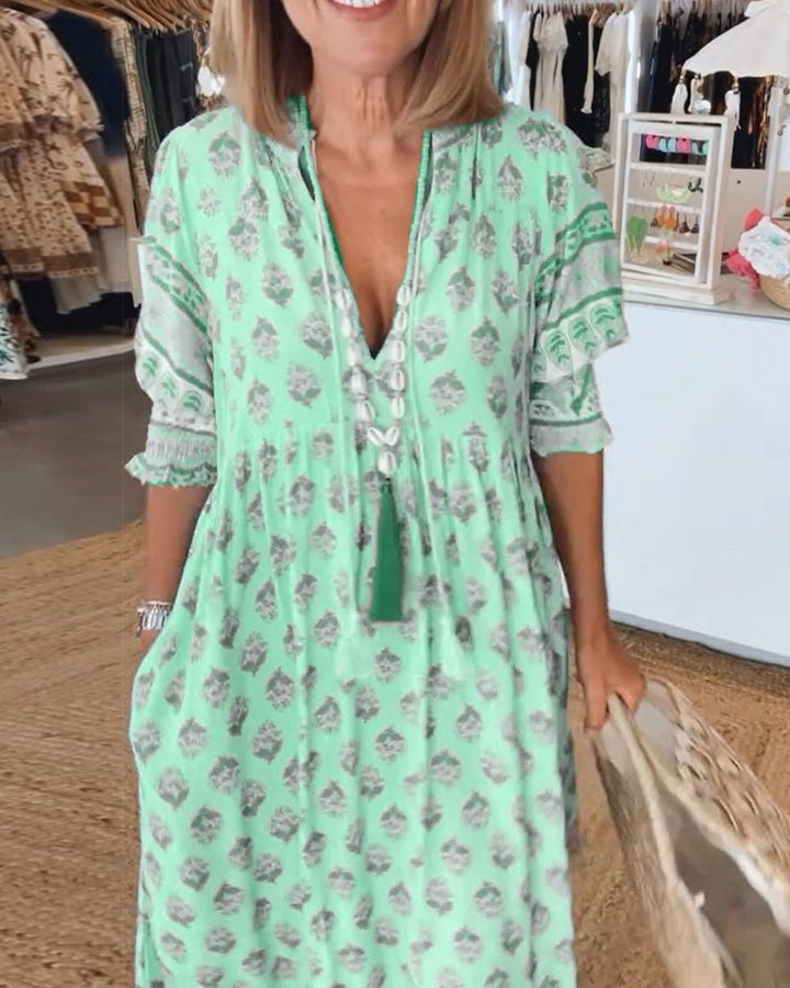 Mana | Abito floreale chic con scollo a V