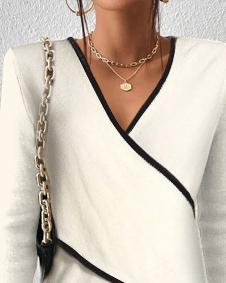 Top elegante da donna in maglia incrociata con scollo a V