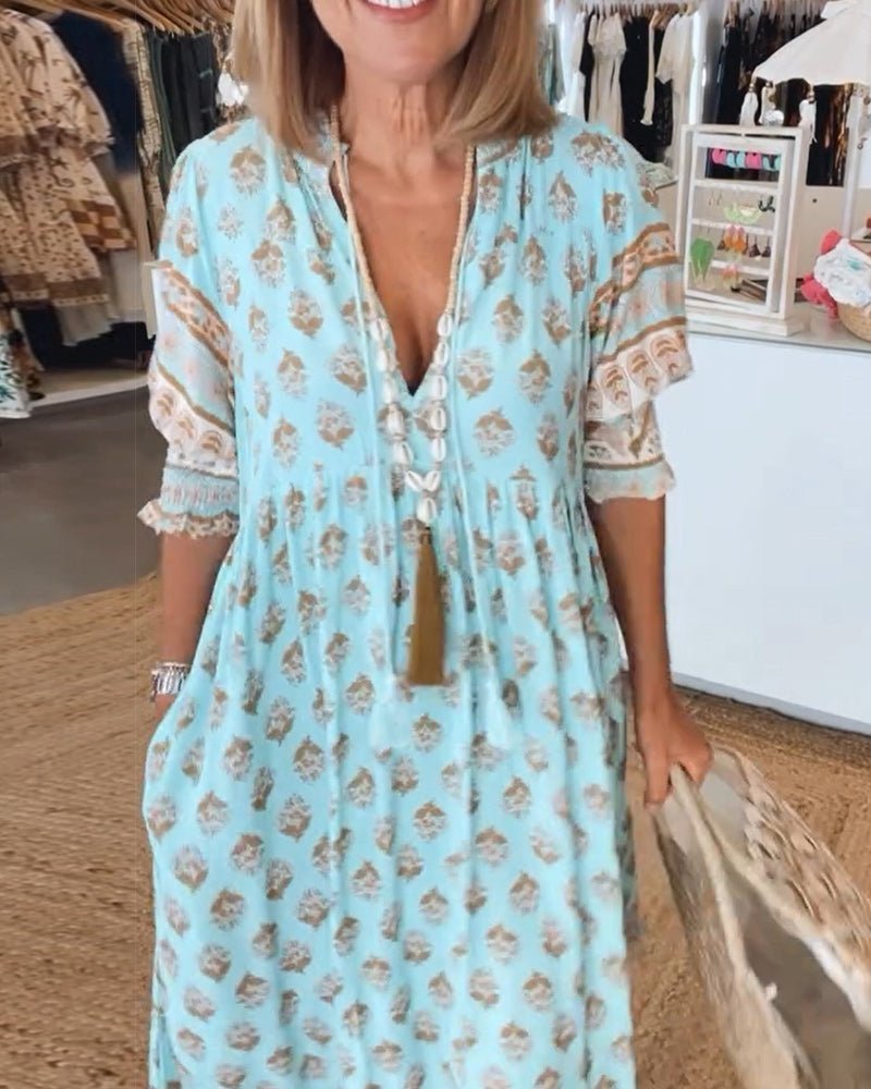 Mana | Abito floreale chic con scollo a V