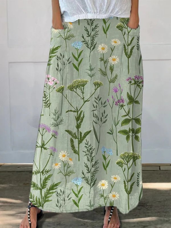 Gonna da donna in lino stampata con motivo a fiori primaverili arricchito e tasche
