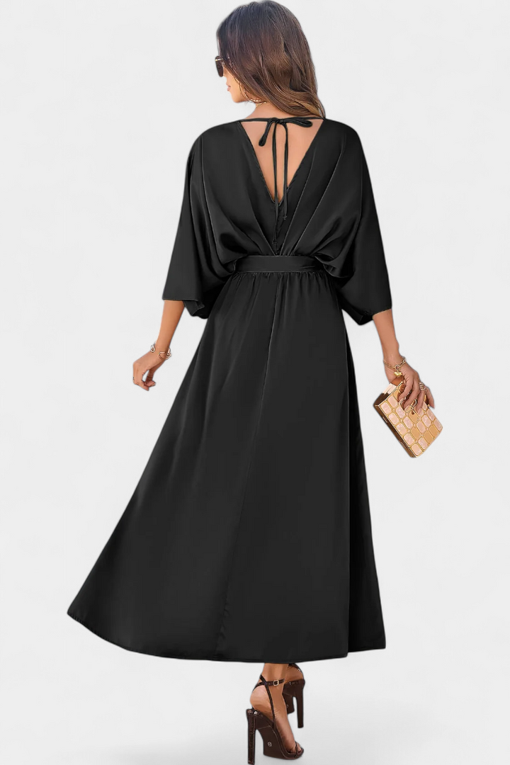 Milly Abito elegante con fiocco e spacco