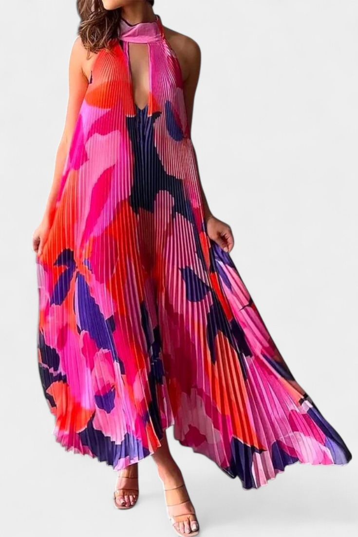 Giselle - longue robe plissée avec décolleté et mouvement élégant