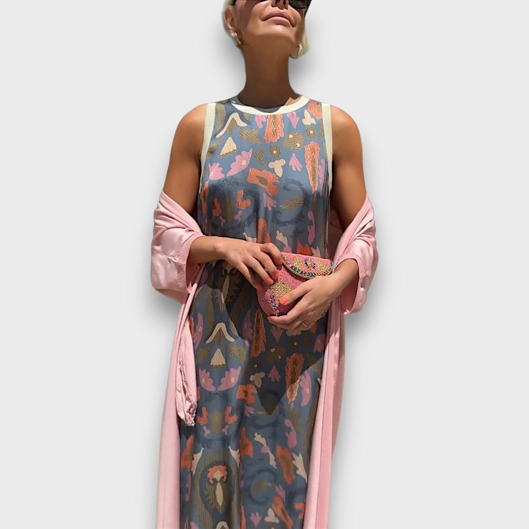 Abito lungo con fantasia floreale e cardigan leggero