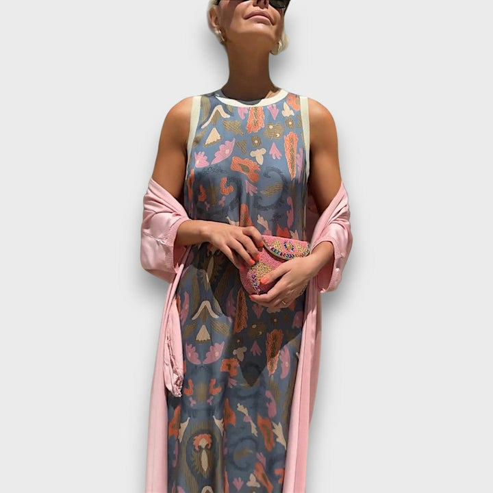 Abito lungo con fantasia floreale e cardigan leggero