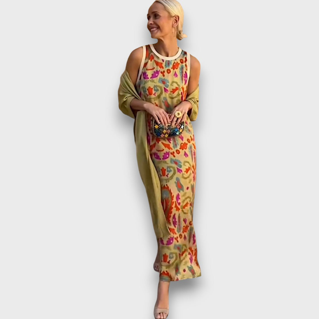 Abito lungo con fantasia floreale e cardigan leggero