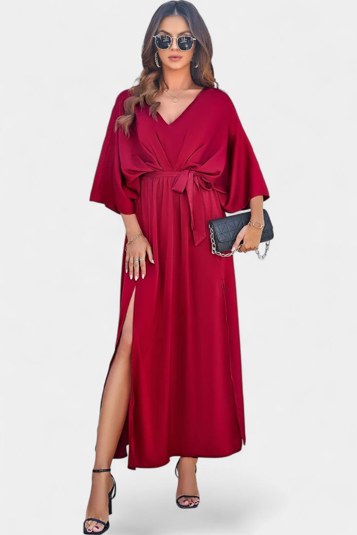 Milly Abito elegante con fiocco e spacco