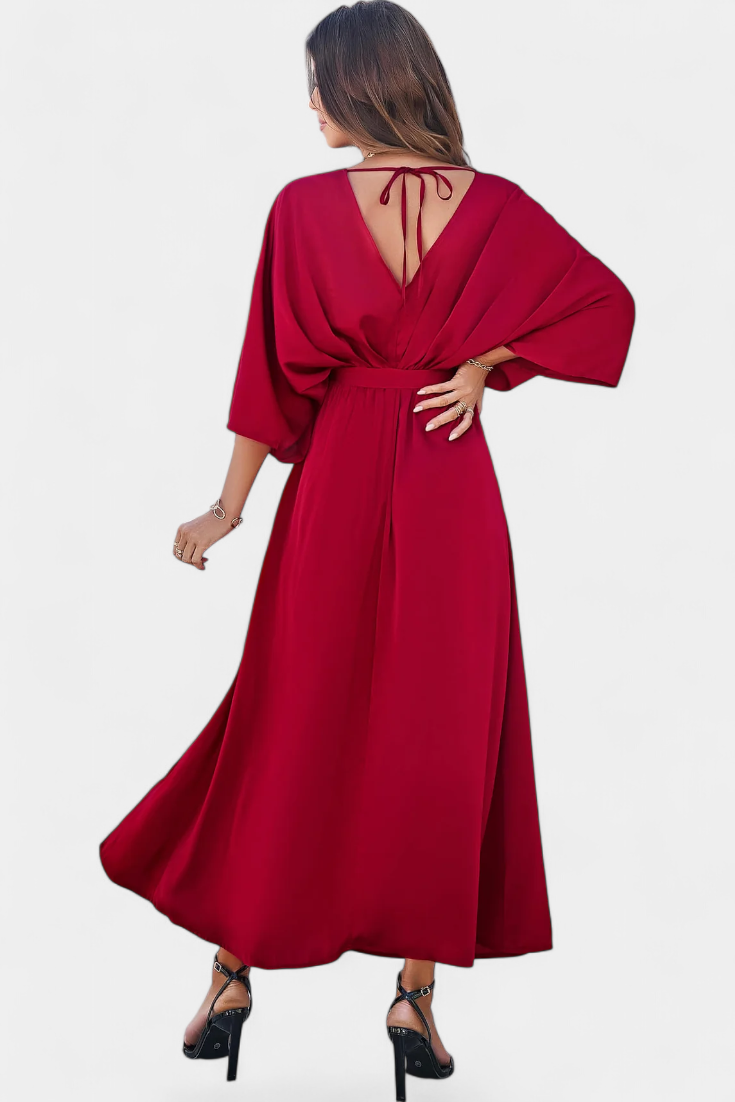 Milly Abito elegante con fiocco e spacco