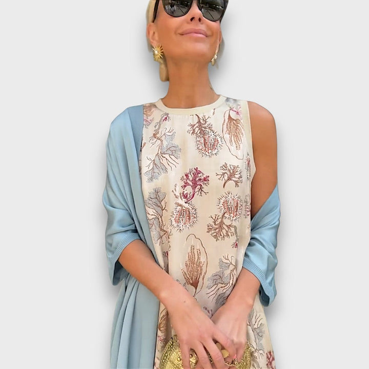 Abito lungo con fantasia floreale e cardigan leggero