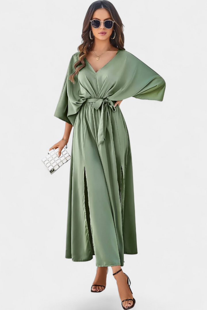Milly Abito elegante con fiocco e spacco