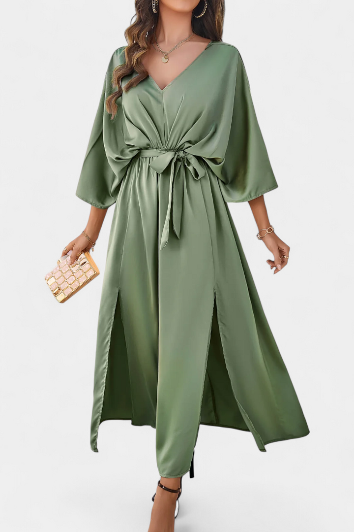 Milly Abito elegante con fiocco e spacco