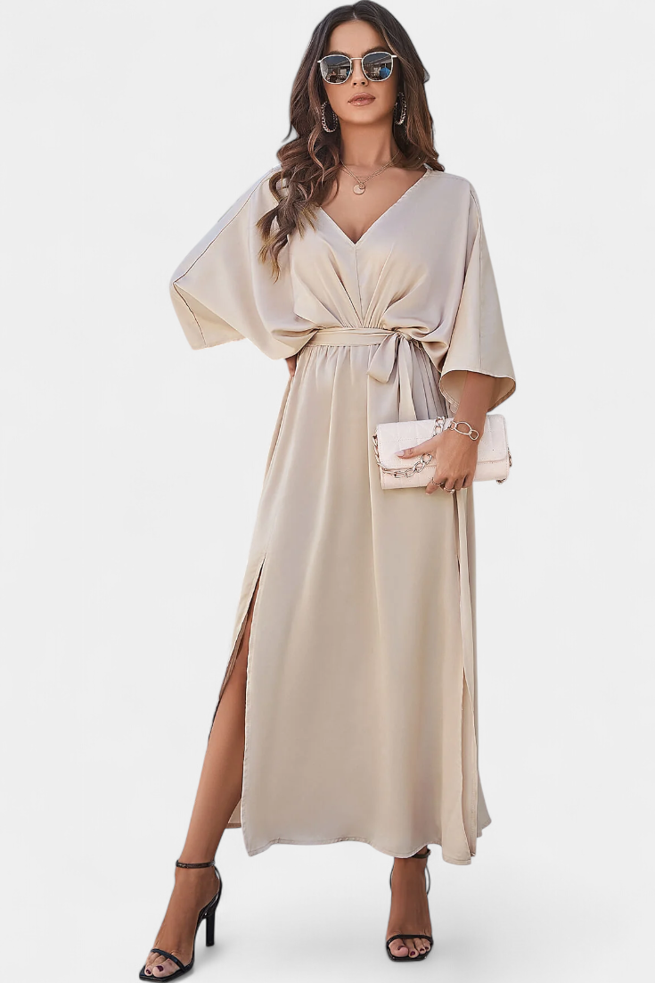 Milly Abito elegante con fiocco e spacco