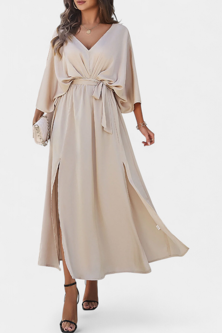 Milly Abito elegante con fiocco e spacco