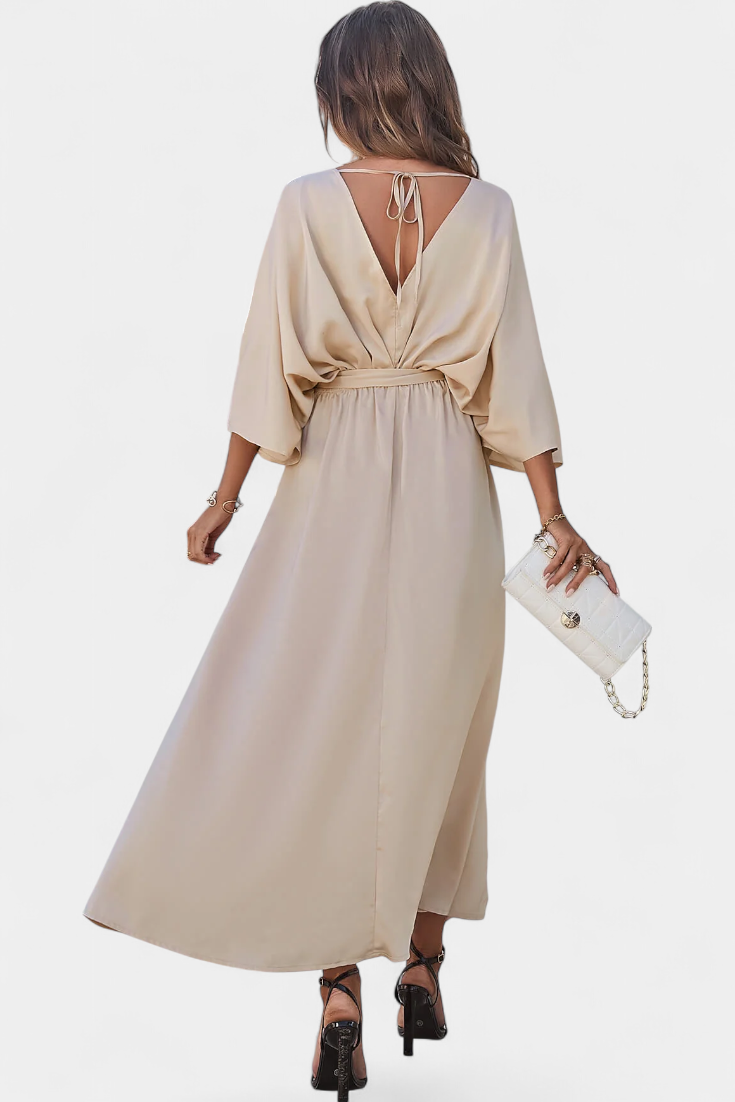 Milly Abito elegante con fiocco e spacco