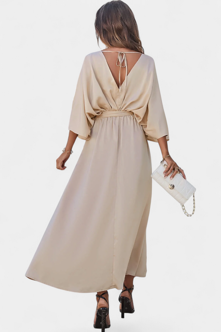 Milly Abito elegante con fiocco e spacco